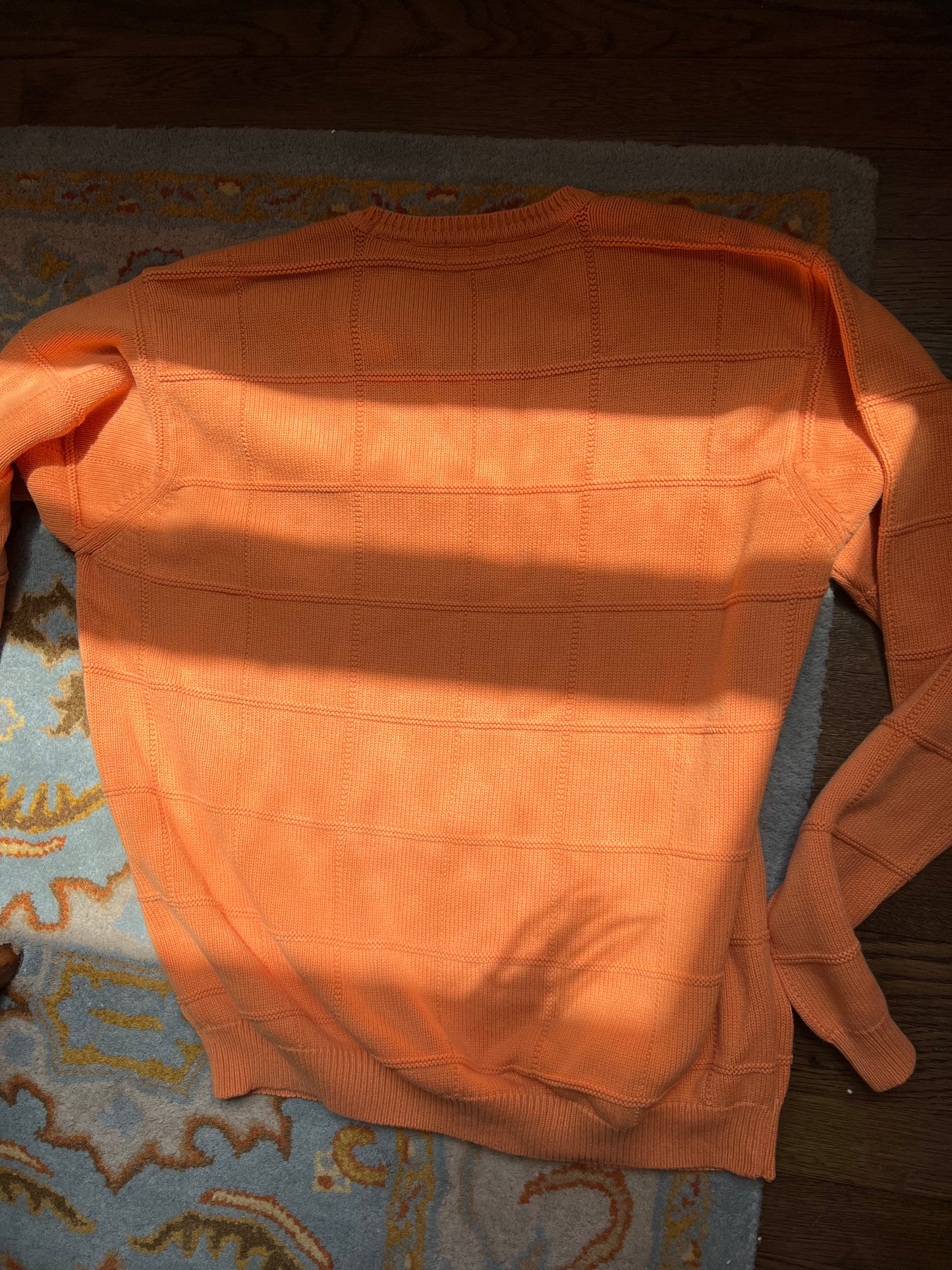 Orange knit sweater